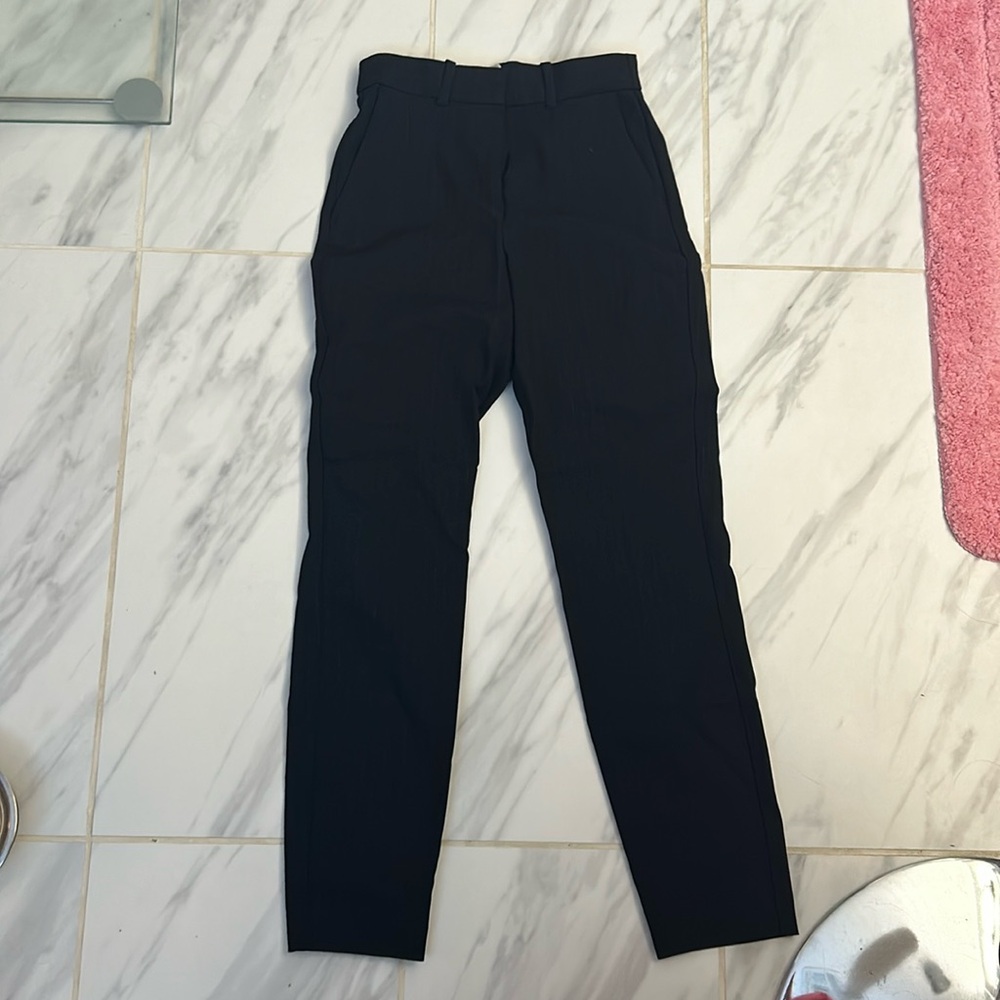 H&M business slacks. Black with faint stripes (see picture 3). Size US 2.